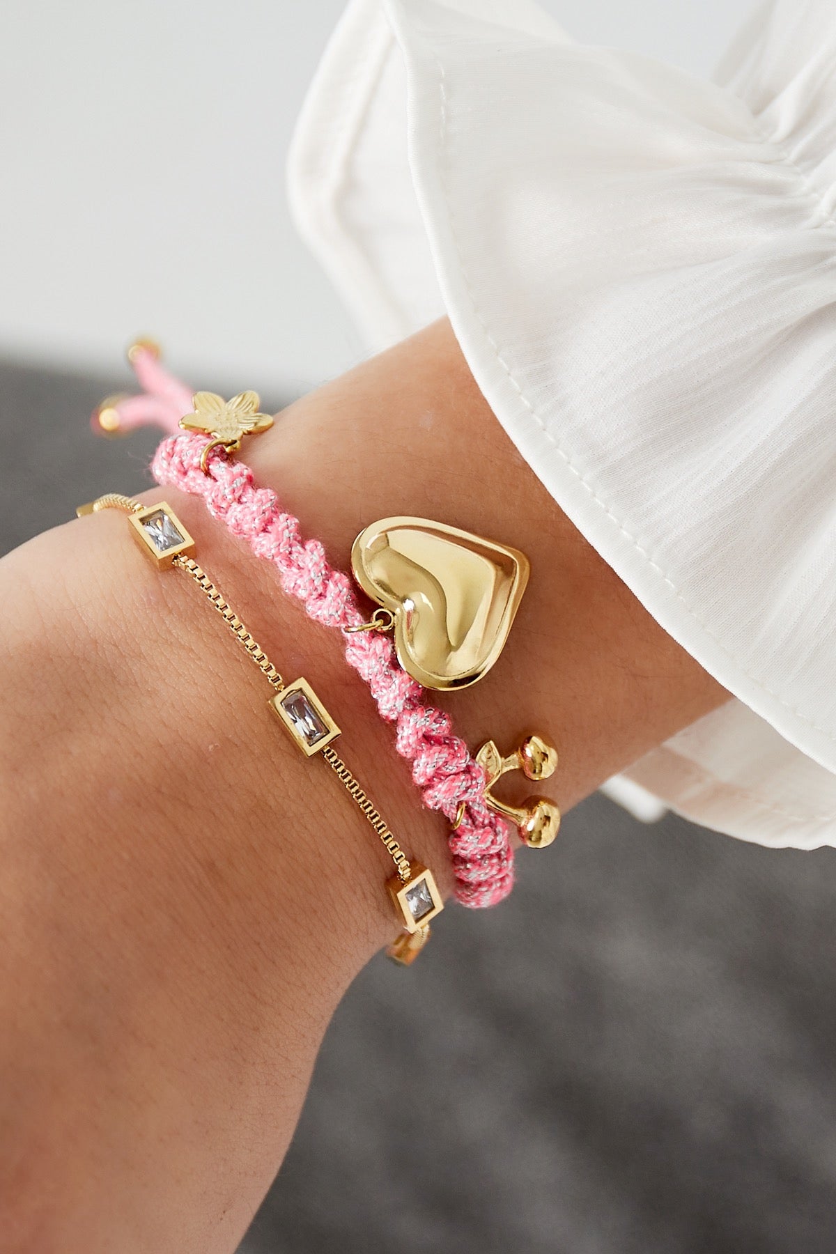 Armband roze bedel
